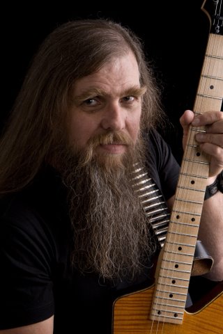 Mike Cochrane as a "Guitarist"